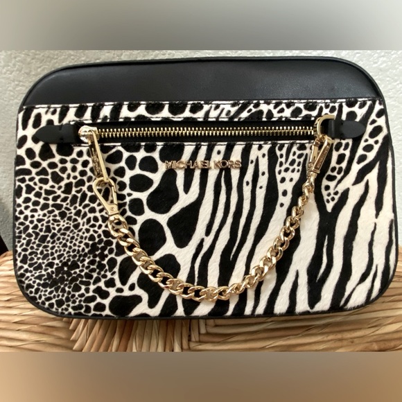 Michael Kors Handbags - Michael Kors animal print, animal hair and leather, Jet Set Crossbody bag